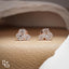 Three Stone Cluster Stud Earrings | Emerald Cut and Pear Shaped Cluster Stud Earrings with Round Accents, 1.50 CT Total Diamond Weight