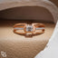 Emerald Cut Engagement Ring with Geometric Setting and Split Shank Band