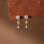 Three-Stone Drop Earrings with Round and Pear-Shaped Diamonds, 1.00 CT Diamond Weight, 3 g Metal Weight