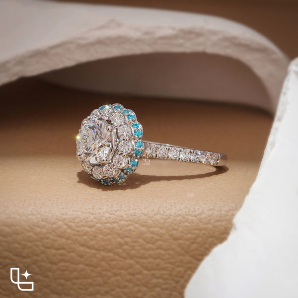 Round Cut Floral Halo Engagement Ring with Blue Accent Stones