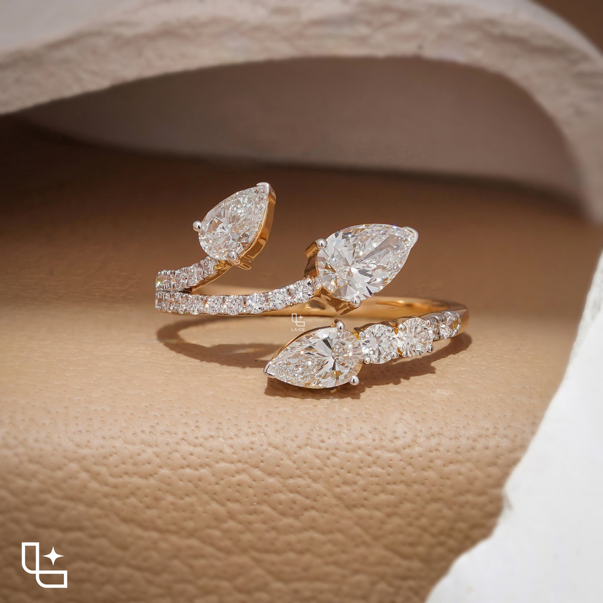 Three Stone Pear Cut Ring with Open Bypass Band and Pavé Accents Main image