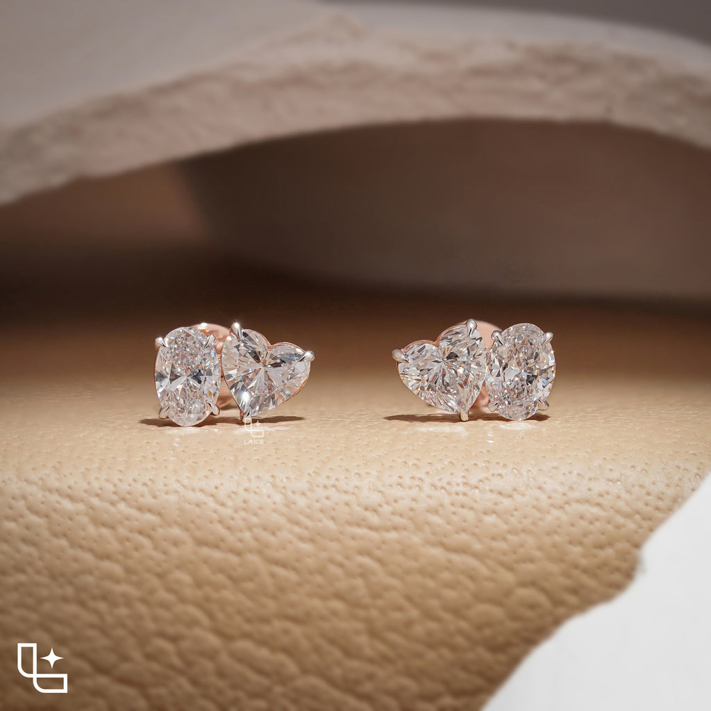 Oval and Heart Shaped Two Stone Stud Earrings with a Romantic Mixed Shape Design, 1.50 CT Total Diamond Weight