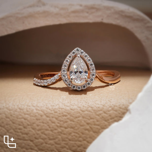 Pear Cut Halo Engagement Ring with Curved Band and Pavé Accent Stones