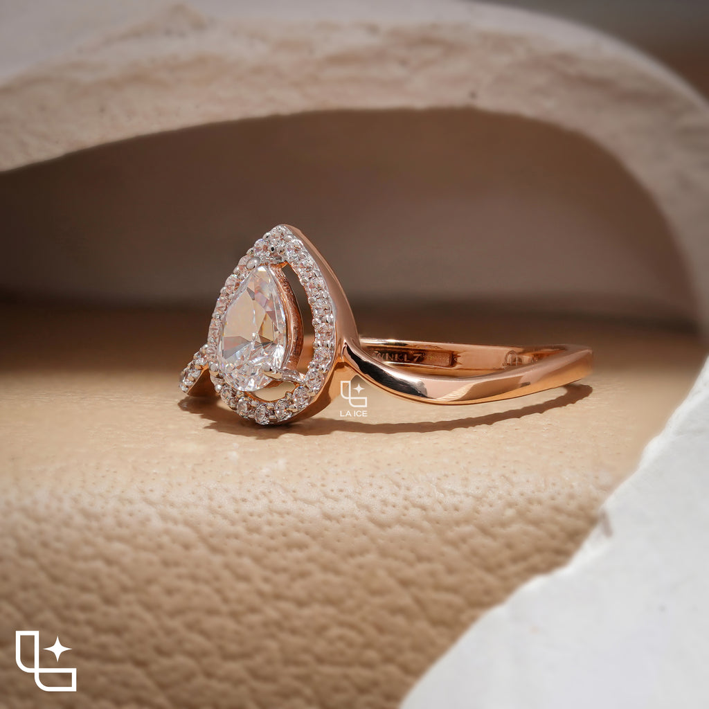 Pear Cut Halo Engagement Ring with Curved Band and Pavé Accent Stones