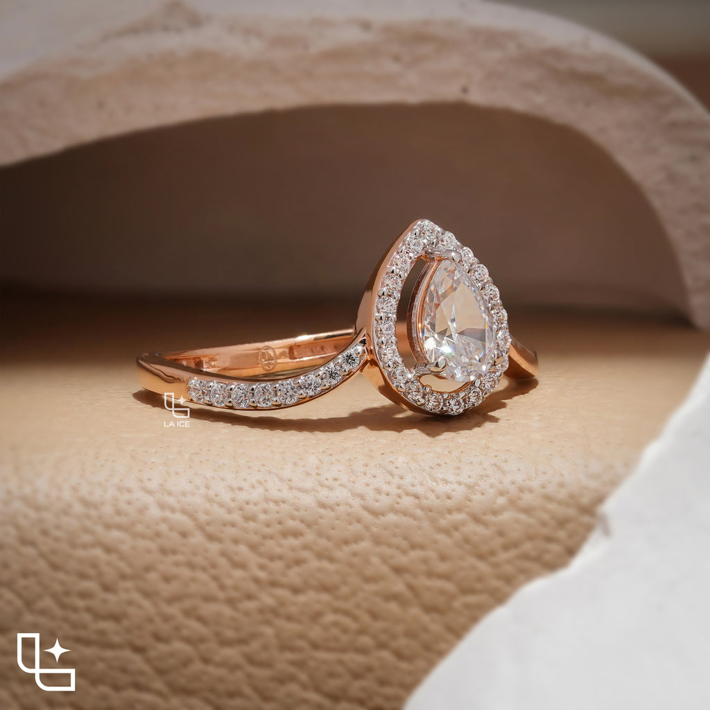 Pear Cut Halo Engagement Ring with Curved Band and Pavé Accent Stones