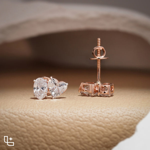Oval and Heart Shaped Two Stone Stud Earrings with a Romantic Mixed Shape Design, 1.50 CT Total Diamond Weight