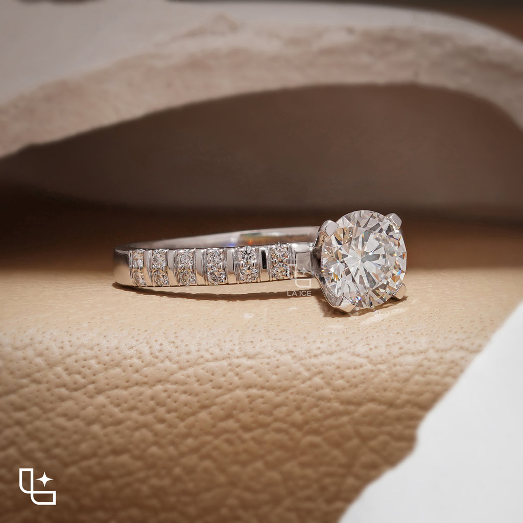 Round Cut Pavé Engagement Ring with Brilliant Center Stone and Sparkling Side Stones
