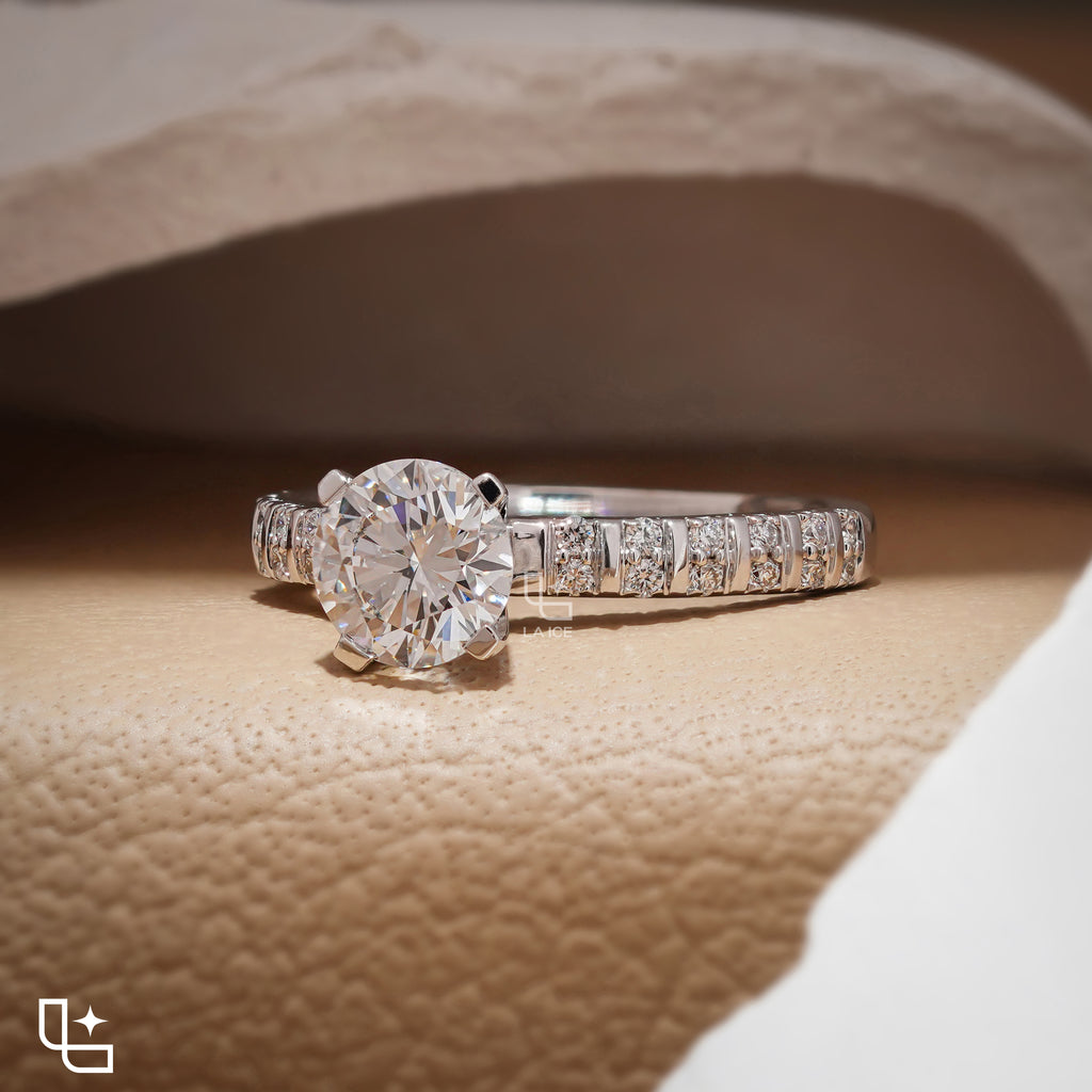 Round Cut Pavé Engagement Ring with Brilliant Center Stone and Sparkling Side Stones