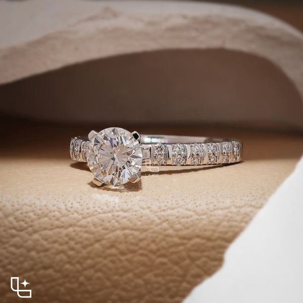 Round Cut Pavé Engagement Ring with Brilliant Center Stone and Sparkling Side Stones