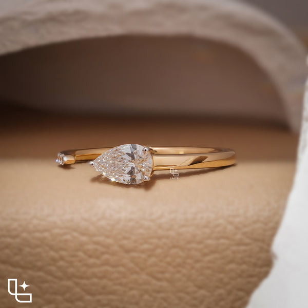 Pear Cut Bypass Engagement Ring with Sleek Polished Band – 0.75 CT Total Diamond Weight, 2.50 g Metal Weight