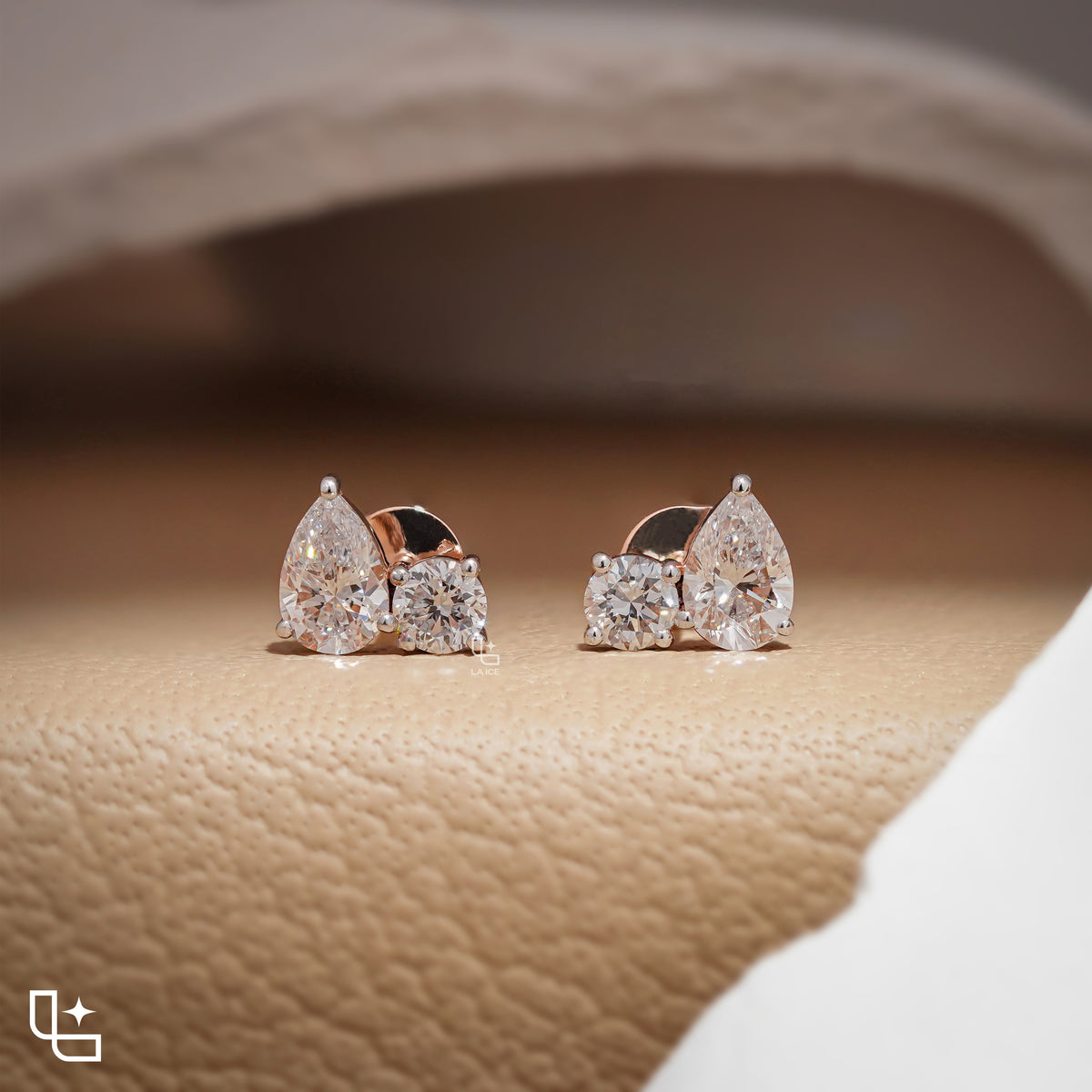 Pear and Round Cut Three-Stone Drop Earrings, 1.00 CT Total Diamond Weight