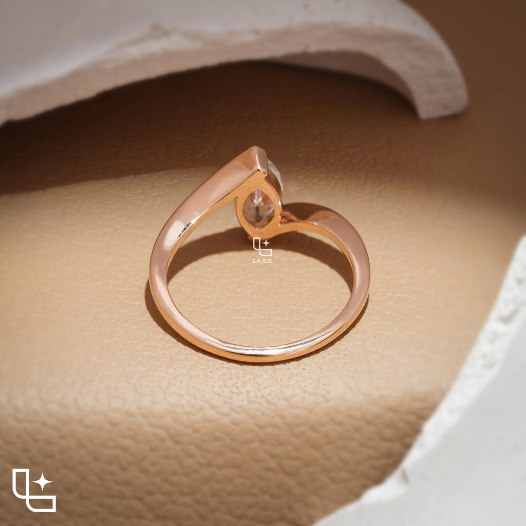 Marquise Cut Solitaire Engagement Ring with Modern Bypass Band Design