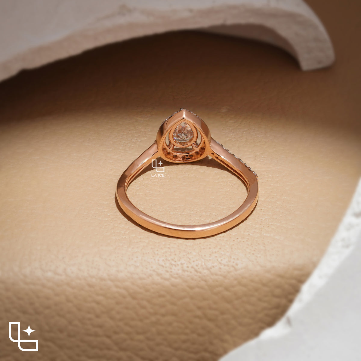 Pear Cut Halo Engagement Ring with Curved Band and Pavé Accent Stones