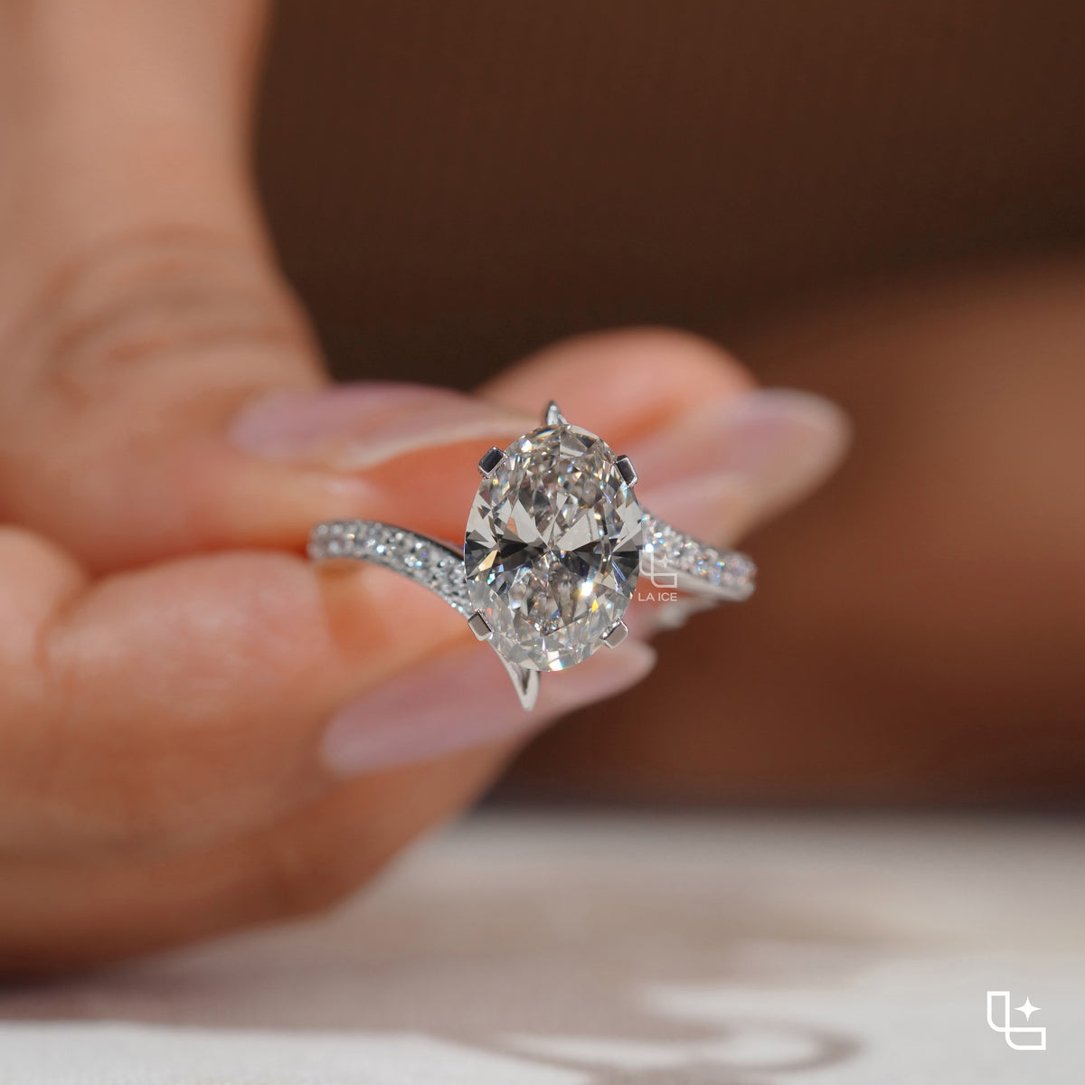 Oval Cut Pavé Engagement Ring with Brilliant Center Stone and Sparkling Side Stones