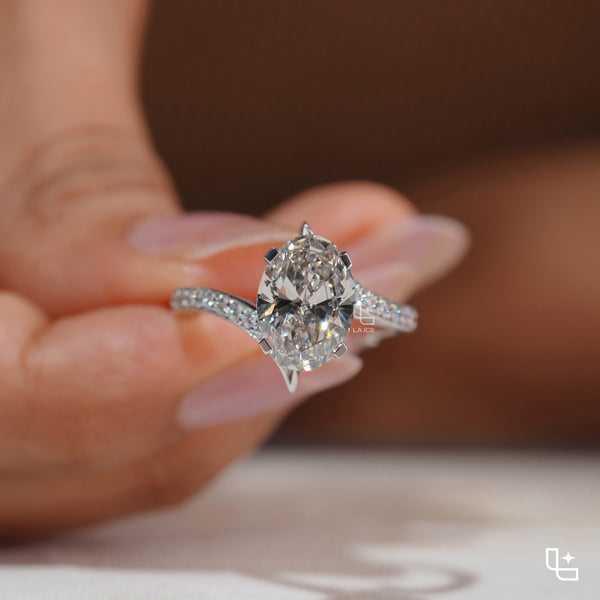 Oval Cut Pavé Engagement Ring with Brilliant Center Stone and Sparkling Side Stones