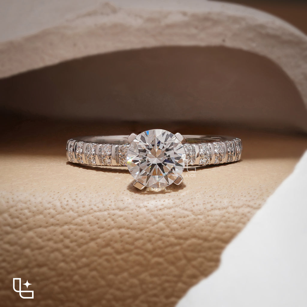 Round Cut Pavé Engagement Ring with Brilliant Center Stone and Sparkling Side Stones