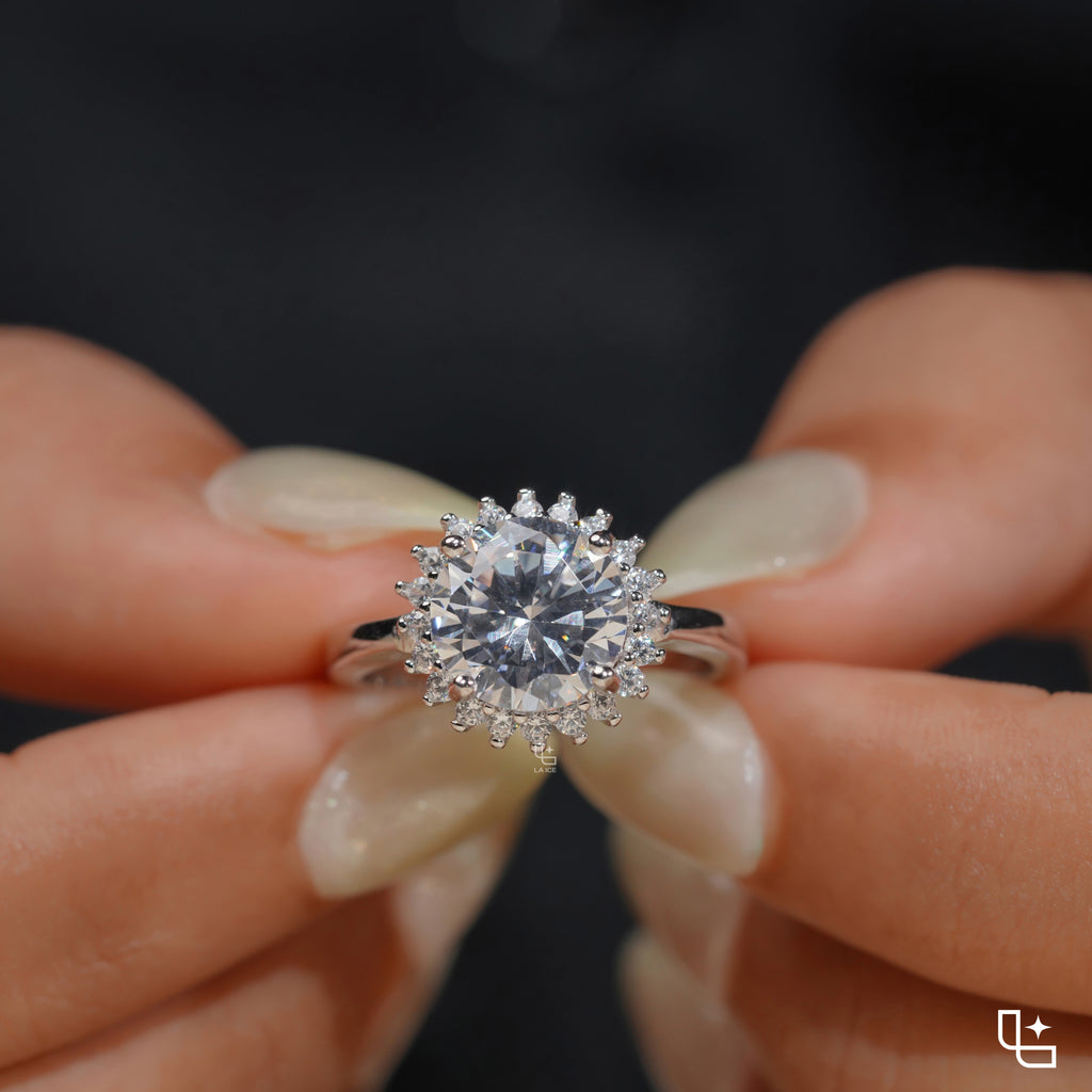 Round Halo Engagement Ring with Sparkling Accent Stones