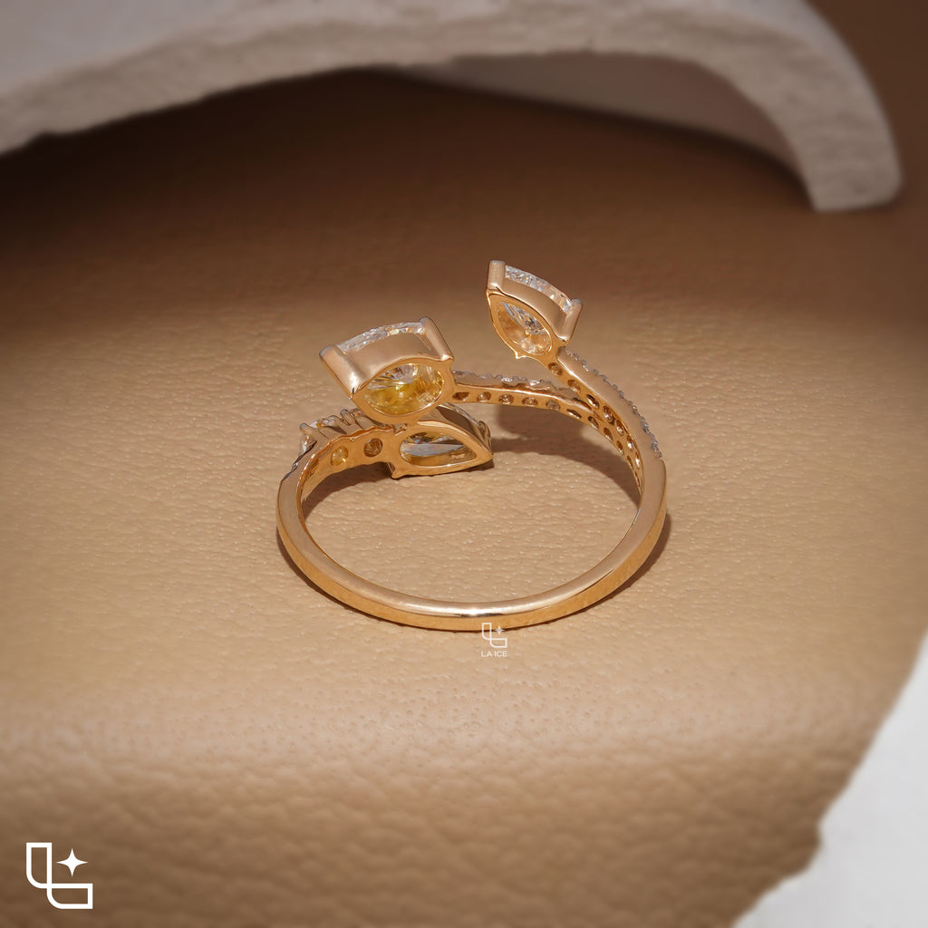 Three Stone Pear Cut Ring with Open Bypass Band and Pavé Accents