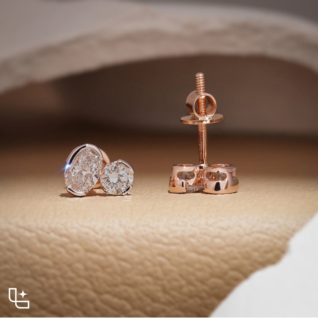 Oval and Round Cut Two Stone Stud Earrings with Asymmetrical Design, 1.50 CT Total Diamond Weight