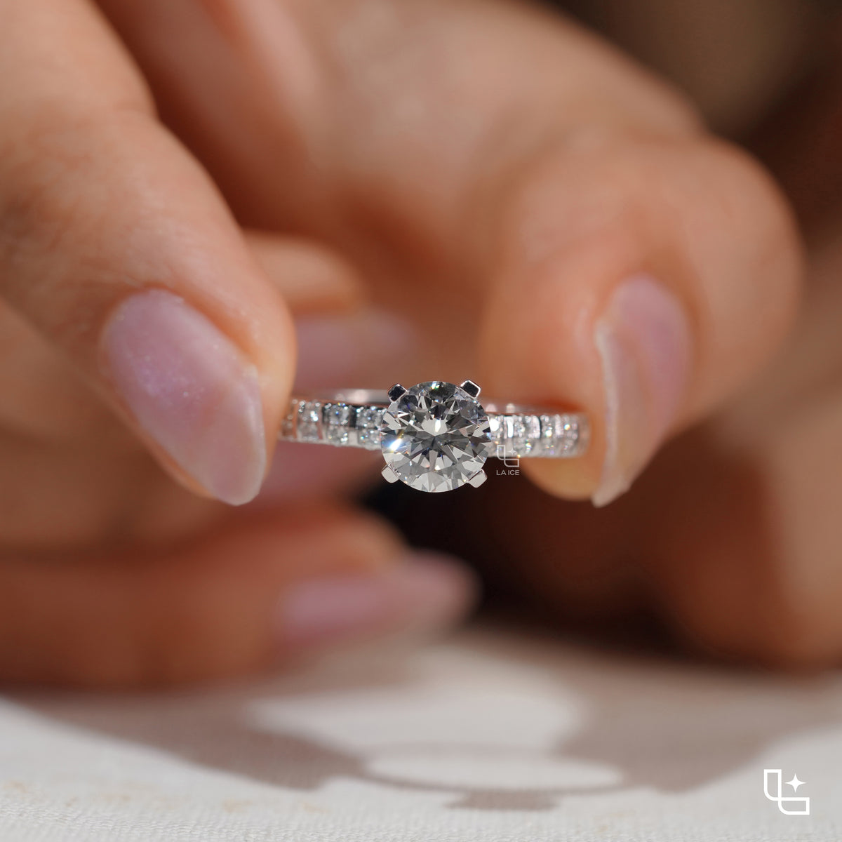Round Cut Pavé Engagement Ring with Brilliant Center Stone and Sparkling Side Stones