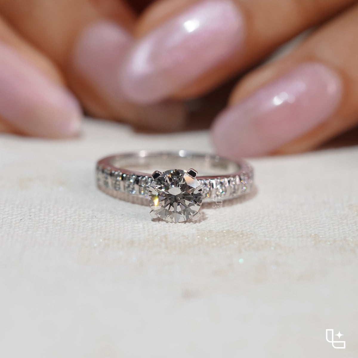 Round Cut Pavé Engagement Ring with Brilliant Center Stone and Sparkling Side Stones