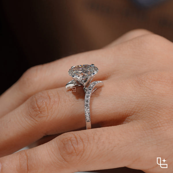 Oval Cut Pavé Engagement Ring with Brilliant Center Stone and Sparkling Side Stones