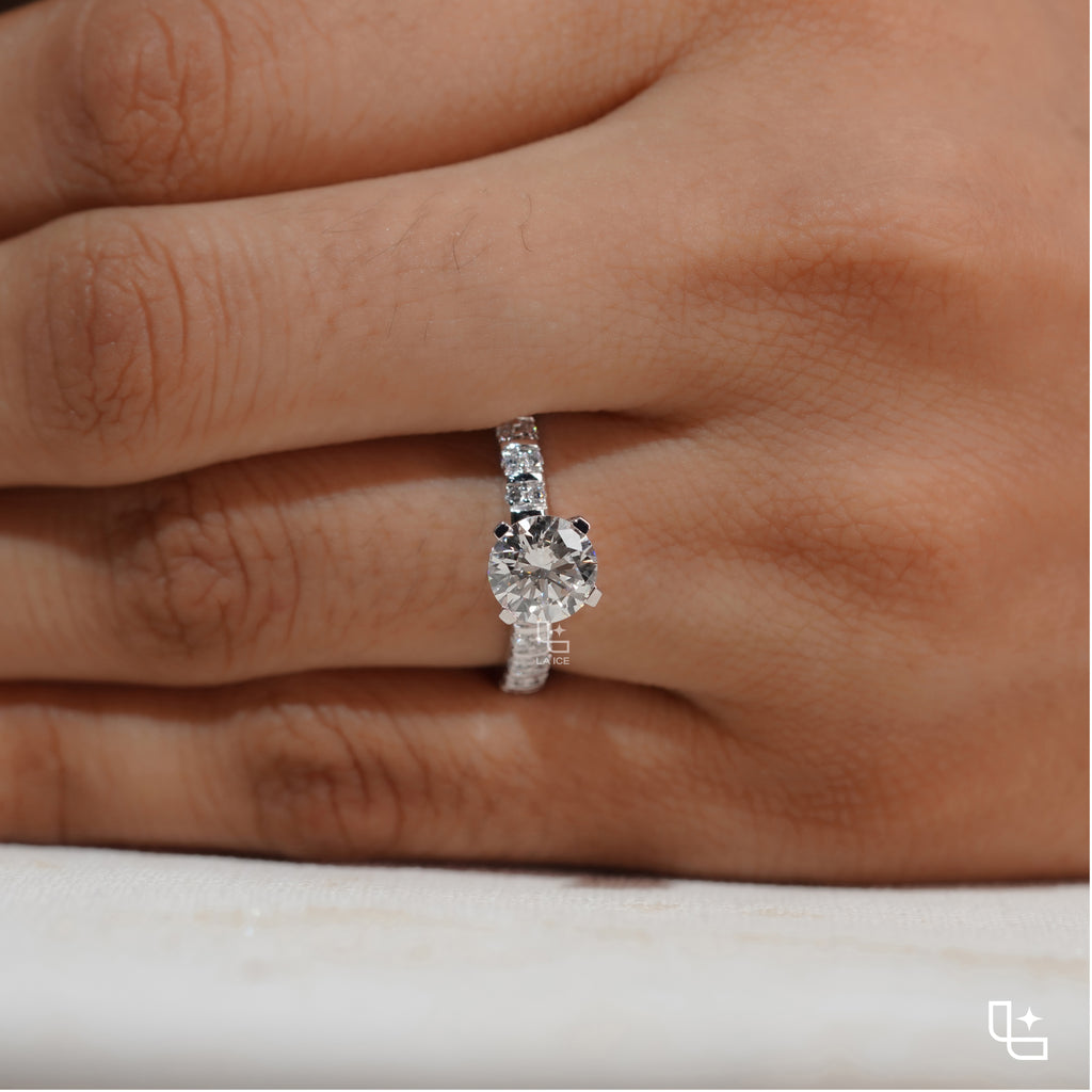 Round Cut Pavé Engagement Ring with Brilliant Center Stone and Sparkling Side Stones