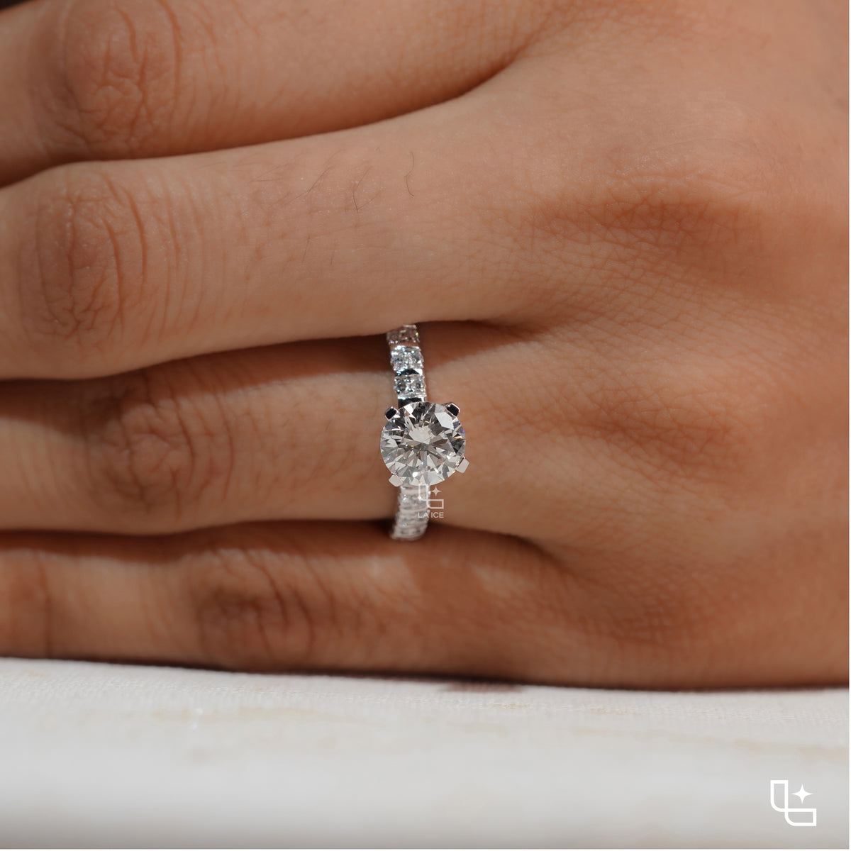 Round Cut Pavé Engagement Ring with Brilliant Center Stone and Sparkling Side Stones