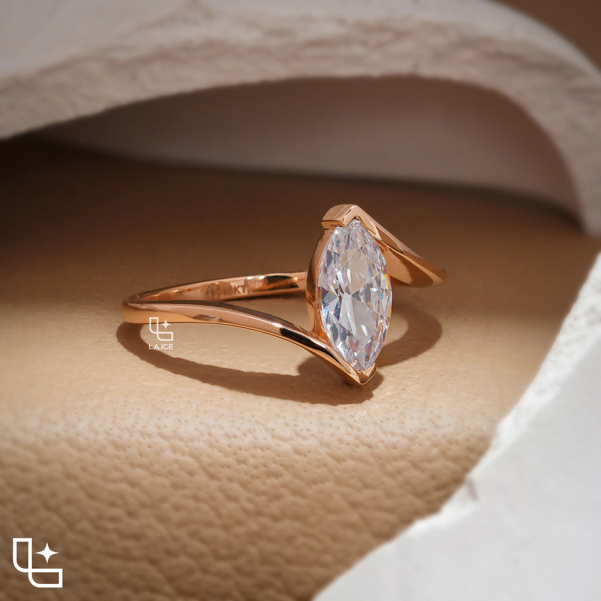 Marquise Cut Solitaire Engagement Ring with Modern Bypass Band Design