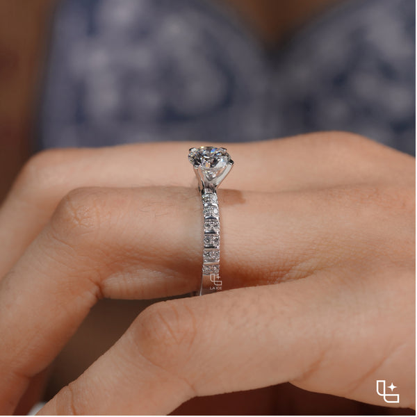 Round Cut Pavé Engagement Ring with Brilliant Center Stone and Sparkling Side Stones