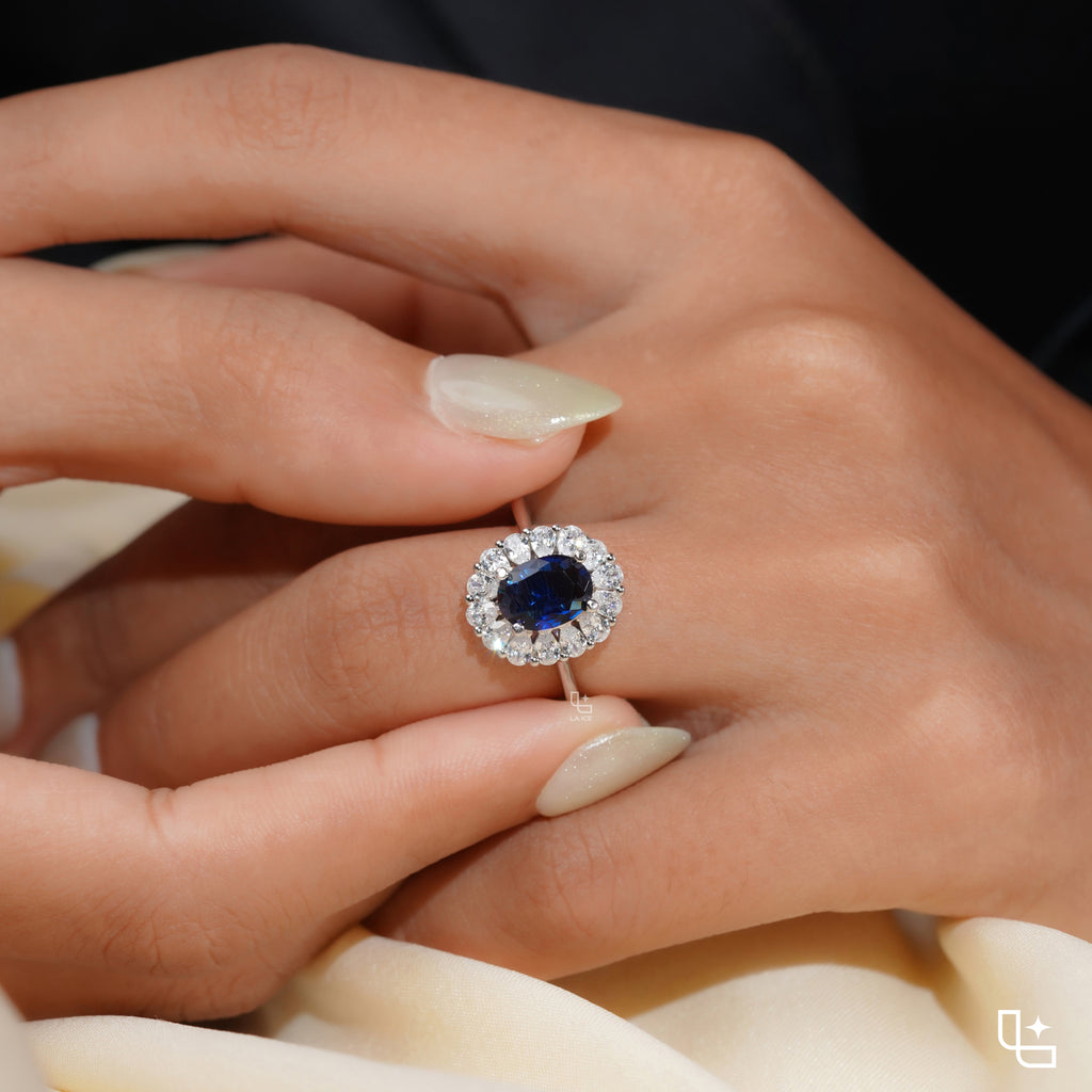 Blue Oval Halo Engagement Ring with Floral Accent Stones