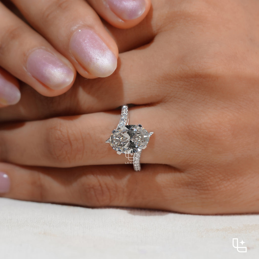 Oval Cut Pavé Engagement Ring with Brilliant Center Stone and Sparkling Side Stones