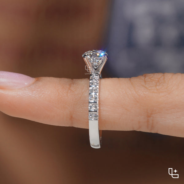 Round Cut Pavé Engagement Ring with Brilliant Center Stone and Sparkling Side Stones