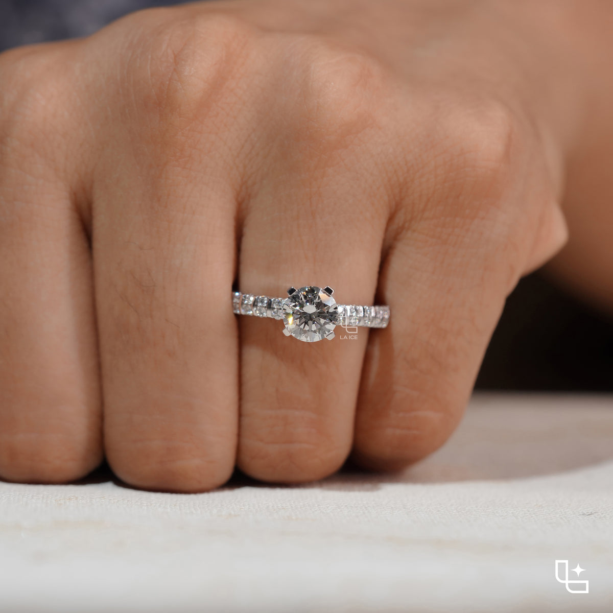 Round Cut Pavé Engagement Ring with Brilliant Center Stone and Sparkling Side Stones