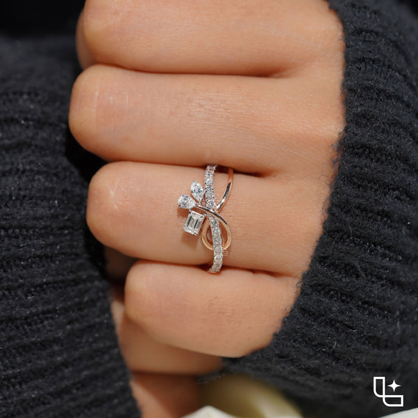 Three Stone Bypass Ring with Emerald Cut Center, Marquise and Pear-Shaped Accents, Pavé Crossover Band, 0.50 CT Center and 0.80 CT Side Diamonds
