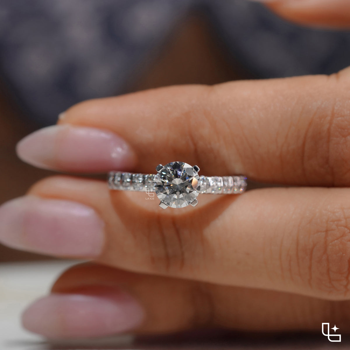 Round Cut Pavé Engagement Ring with Brilliant Center Stone and Sparkling Side Stones