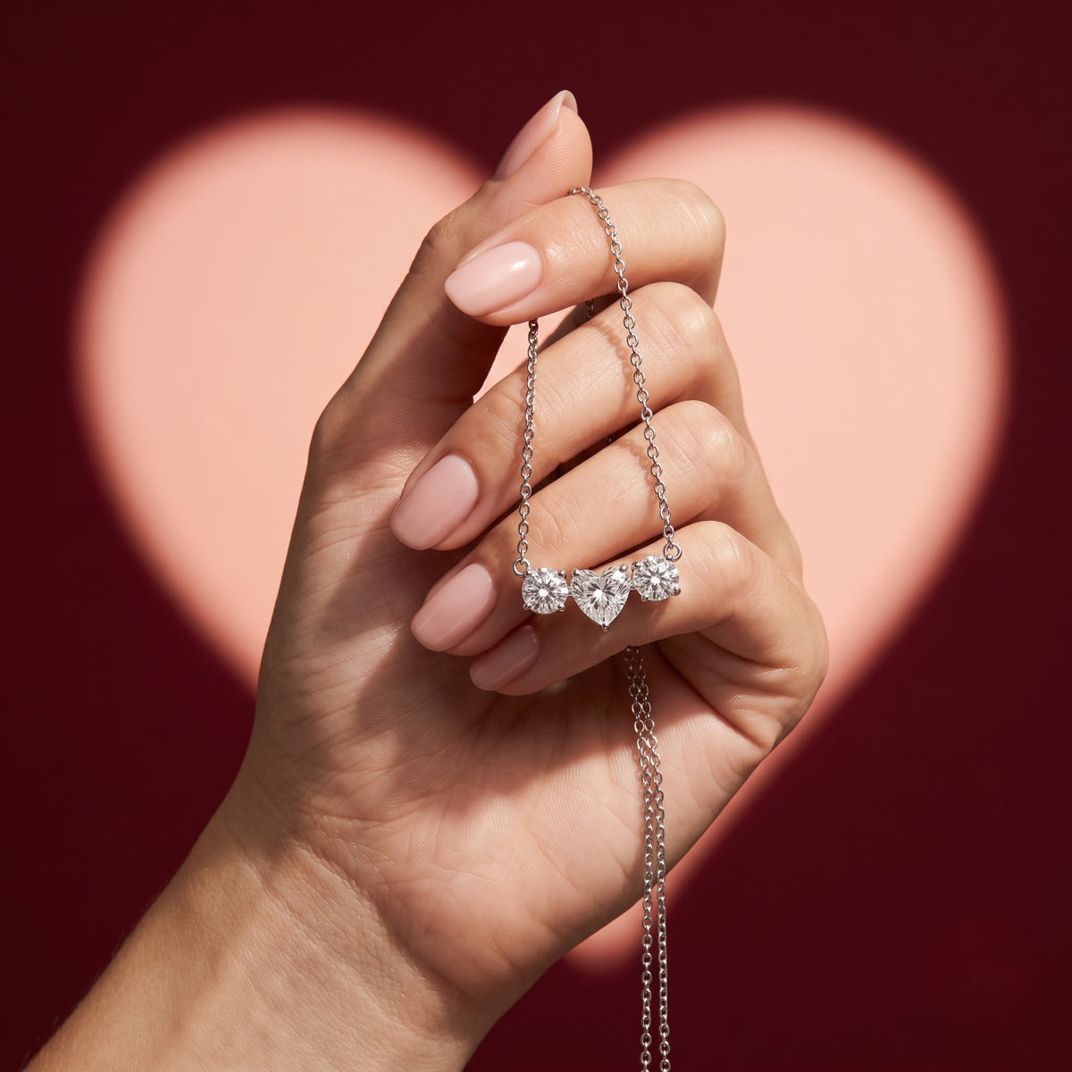 Three Stone Heart Pendant Necklace with Round Accents and Delicate Chain, 0.75 CT Diamond Weight, 2.50 g Metal Weight