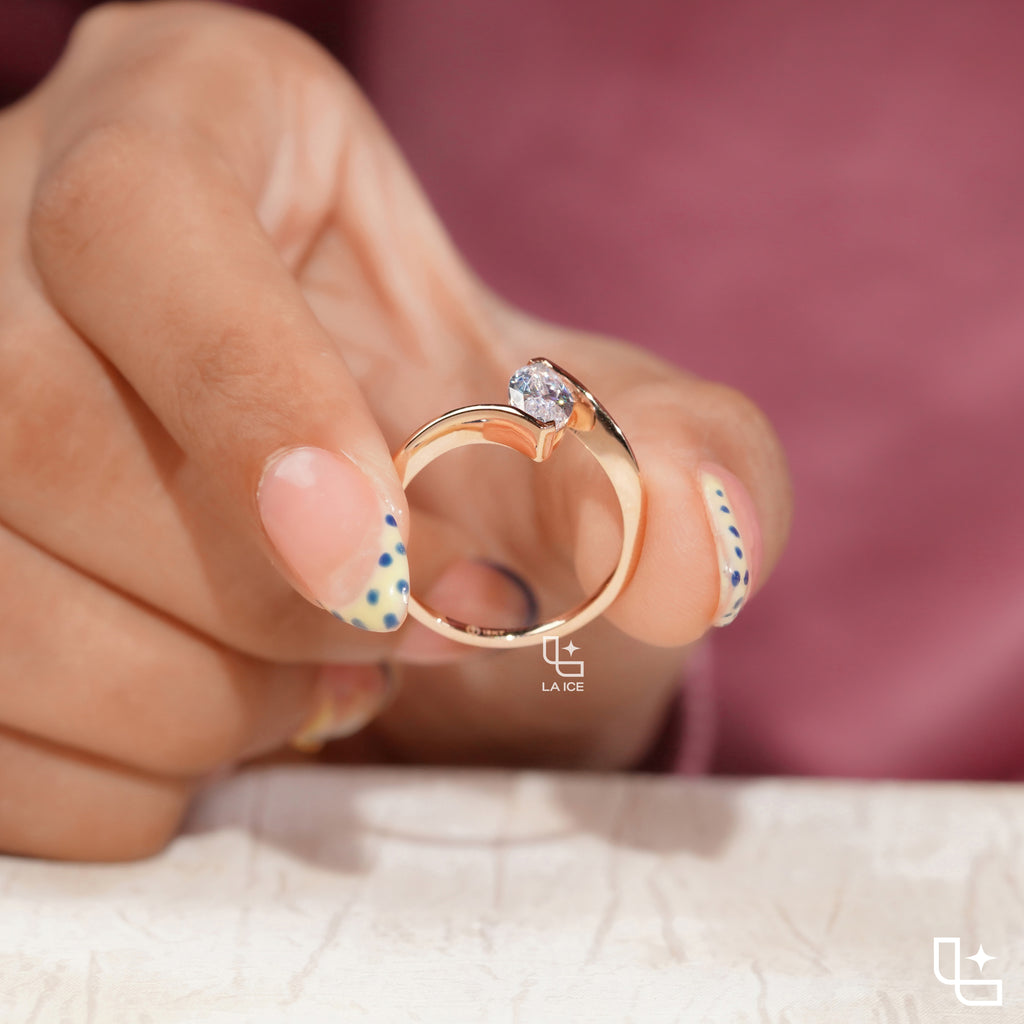 Marquise Cut Solitaire Engagement Ring with Modern Bypass Band Design