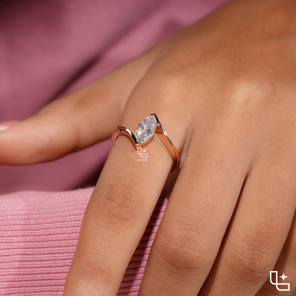 Marquise Cut Solitaire Engagement Ring with Modern Bypass Band Design