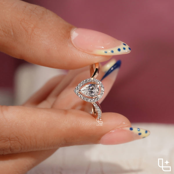Pear Cut Halo Engagement Ring with Curved Band and Pavé Accent Stones