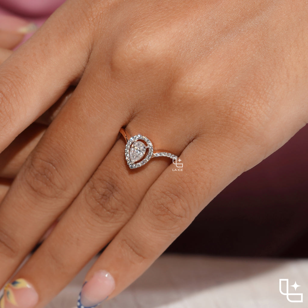 Pear Cut Halo Engagement Ring with Curved Band and Pavé Accent Stones