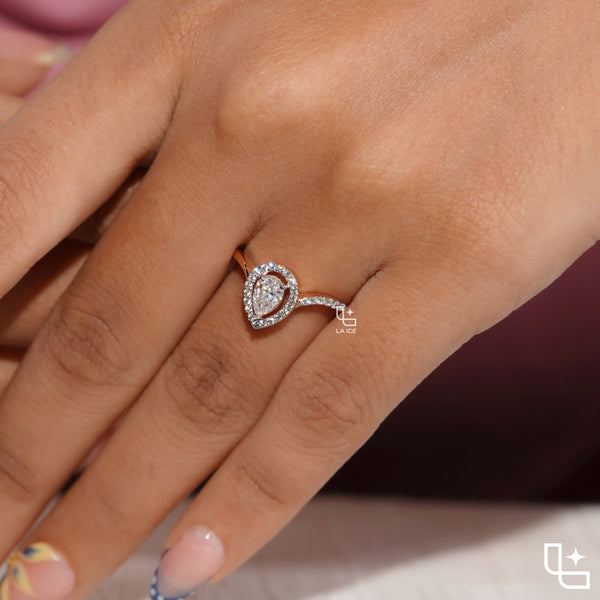 Pear Cut Halo Engagement Ring with Curved Band and Pavé Accent Stones