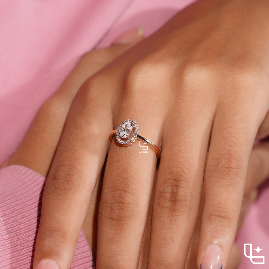 Oval Cut Halo Engagement Ring with Sparkling Accent Stones