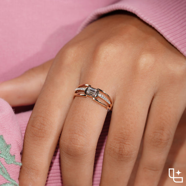 Emerald Cut Engagement Ring with Geometric Setting and Split Shank Band