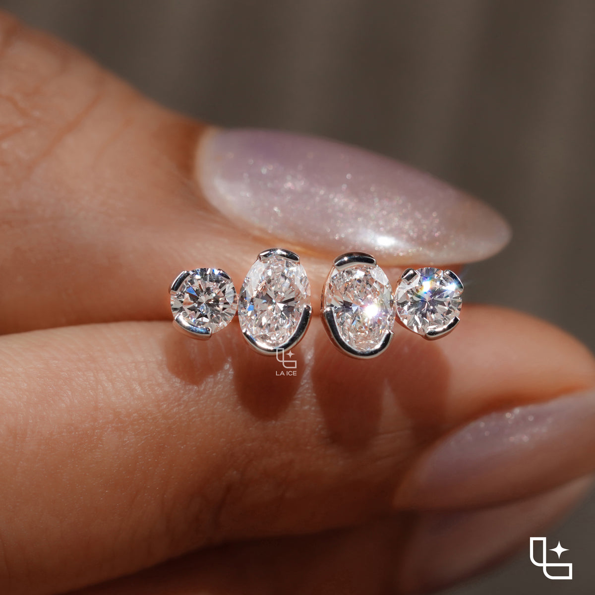 Oval and Round Cut Two Stone Stud Earrings with Asymmetrical Design, 1.50 CT Total Diamond Weight