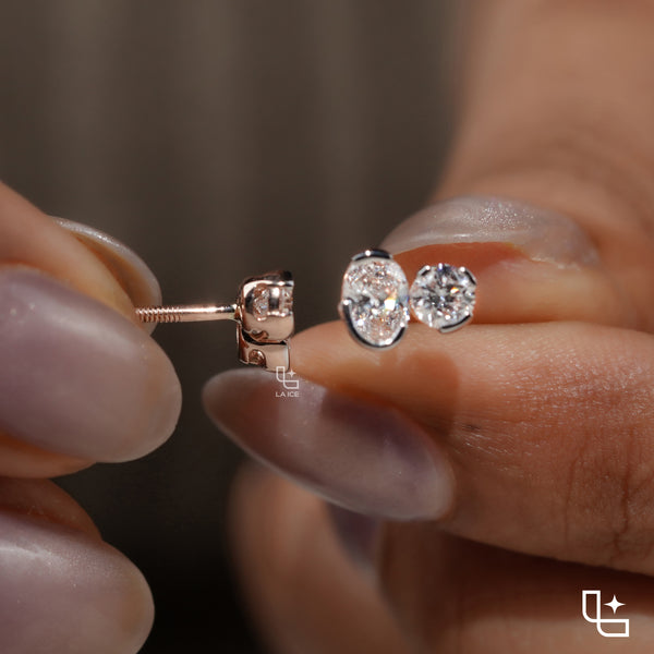 Oval and Round Cut Two Stone Stud Earrings with Asymmetrical Design, 1.50 CT Total Diamond Weight