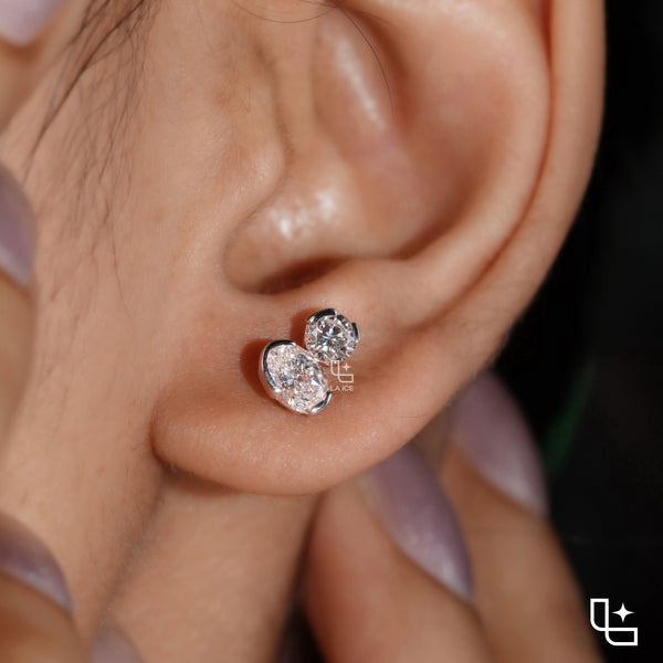 Oval and Round Cut Two Stone Stud Earrings with Asymmetrical Design, 1.50 CT Total Diamond Weight