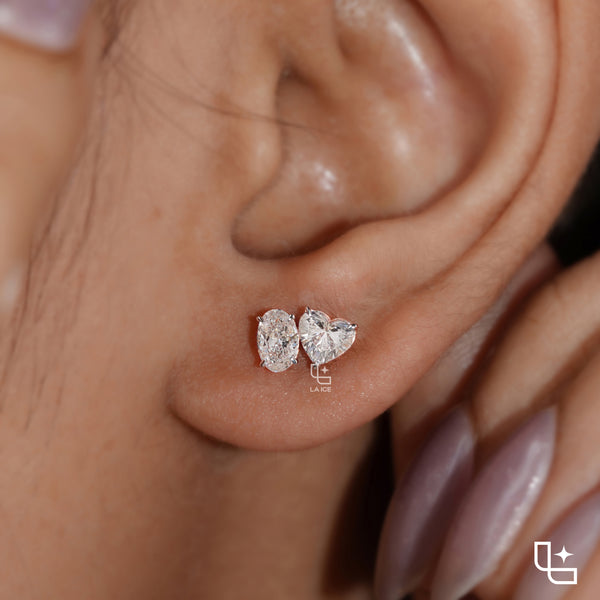 Oval and Heart Shaped Two Stone Stud Earrings with a Romantic Mixed Shape Design, 1.50 CT Total Diamond Weight