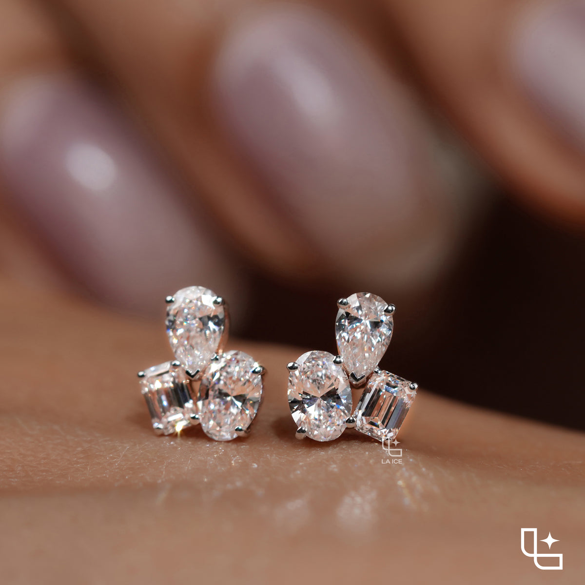 Three Stone Cluster Stud Earrings | Emerald Cut and Pear Shaped Cluster Stud Earrings with Round Accents, 1.50 CT Total Diamond Weight