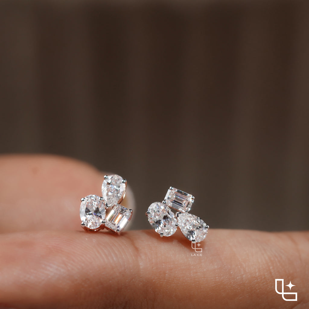 Three Stone Cluster Stud Earrings | Emerald Cut and Pear Shaped Cluster Stud Earrings with Round Accents, 1.50 CT Total Diamond Weight